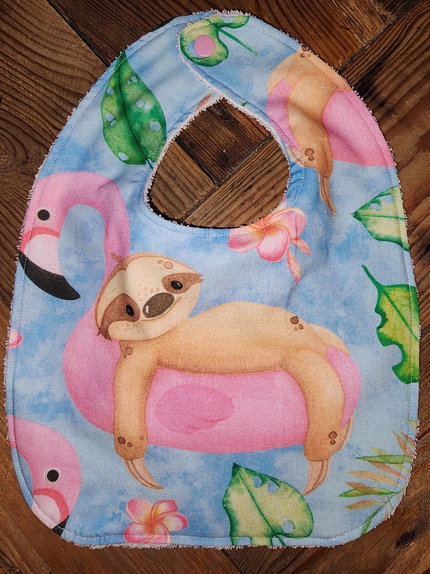 Sloth on a Flamingo Float Bib