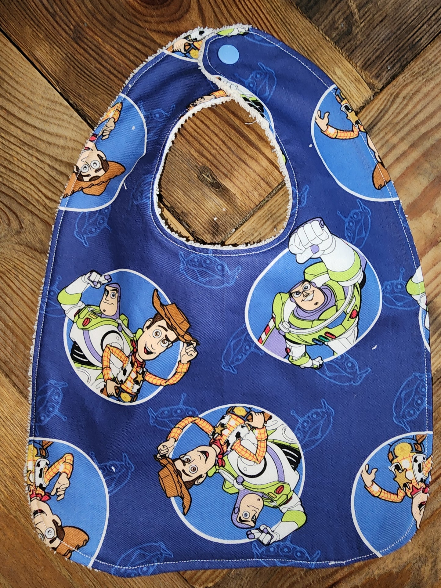 Toy Story Buzz and Woody Baby Bib