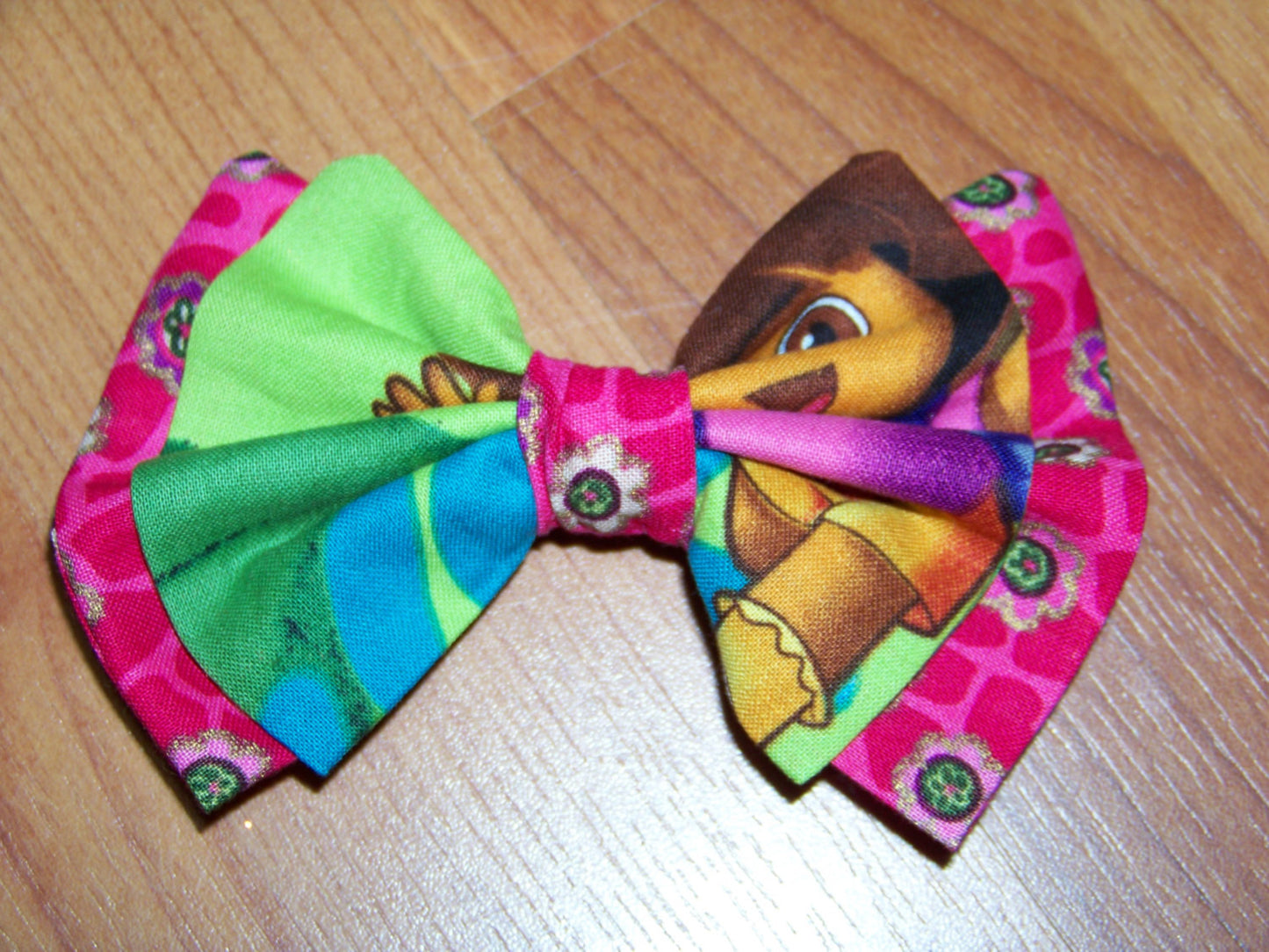 Dora hair bow your choice of clip girls Dora cloth hairbow